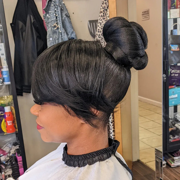 Thick Bangs and Updo - a woman in a side view