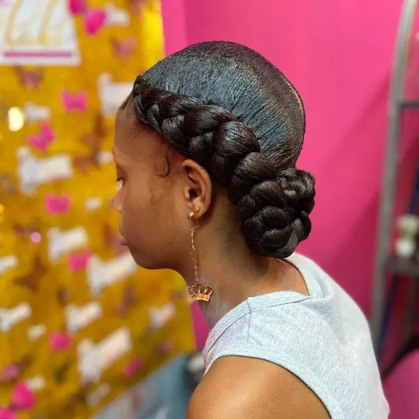 Two Cornrows Hairstyle - woman in a side view
