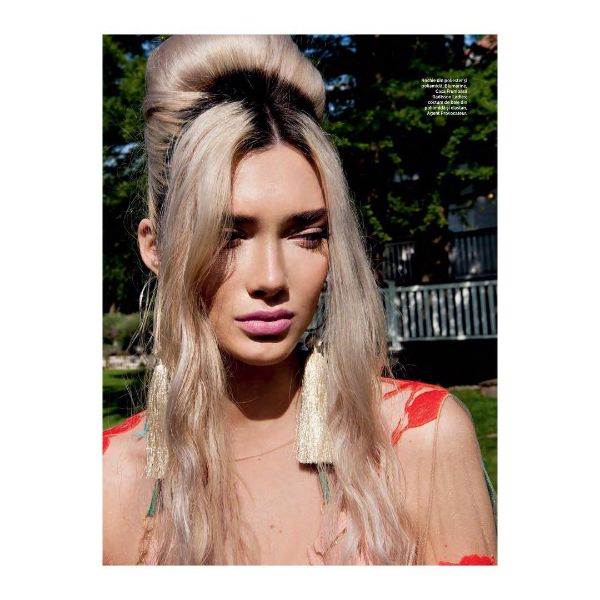 Elegant Bun for Blonde Hair with Dark Roots and Free Falling Front Pieces