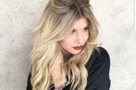 Messy-Half-bun-for-Layered-Long-Blonde-Hair