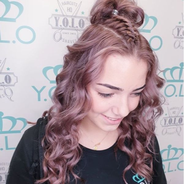 Central Half Braid with Top Knot for Pink Curly Hair
