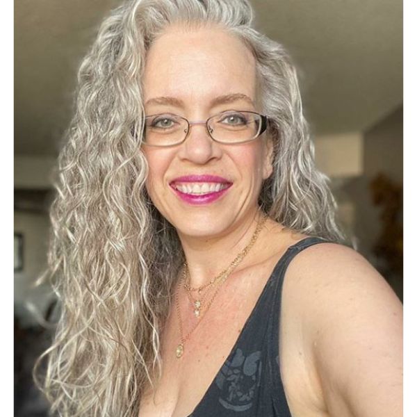  Long Curly Hairstyle with Side Part for Grey Natural Hair