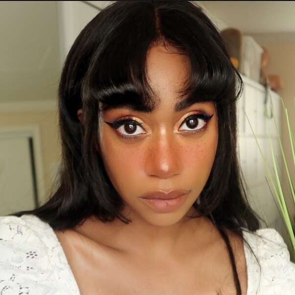 Retro Type of Bangs with Middle Part