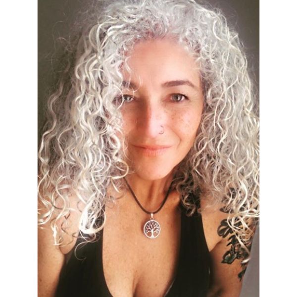 Silver Fox Long Curly Hairstyle for Women OVer 60