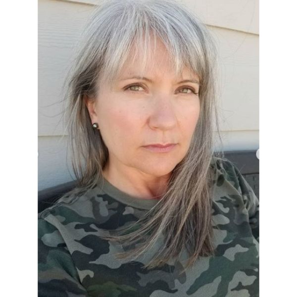 Silver Fox Medium Cut with Bangs Hairstyles for Women over 60