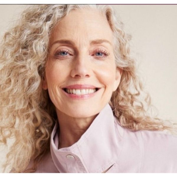 Curly Blonde Long Hairstyle For Women Over 50