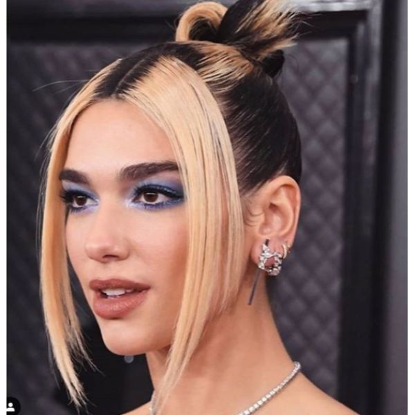 Dua Lipa's '90s Style Updo with Face Framing Blonde Bangs