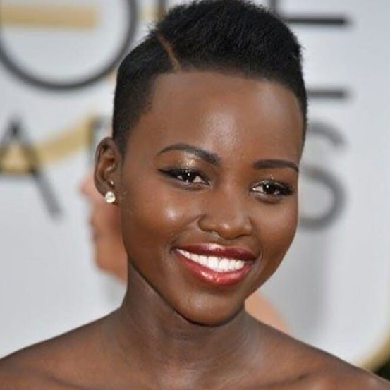 a woman with Up-swept Taper Cut with Side Part