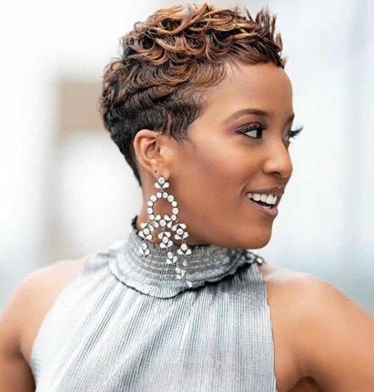 a woman with Short Chopped Medium Brown Hair Shaved Hairstyles for Black Women