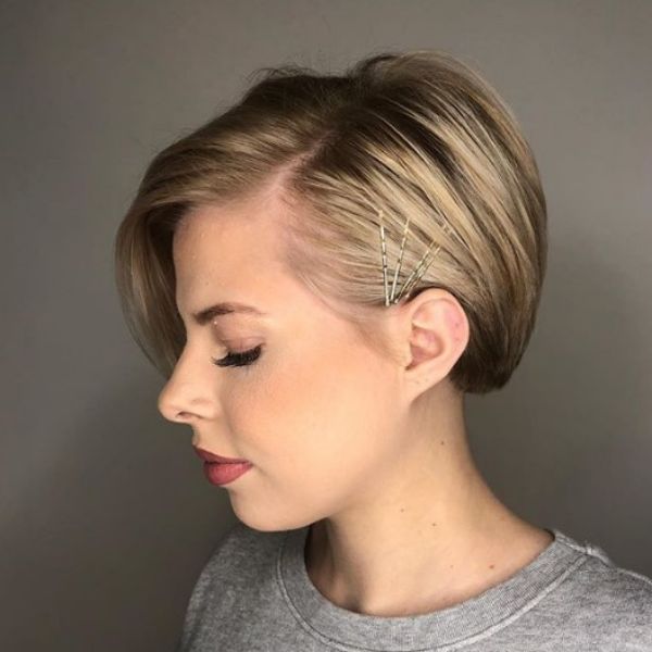 Blonde Pixie Cut with Gold Bobby Pins Hairstyle