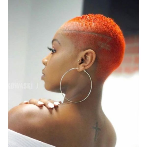 shaved hairstyles for black women Blurry Orange Fade with Razor Design