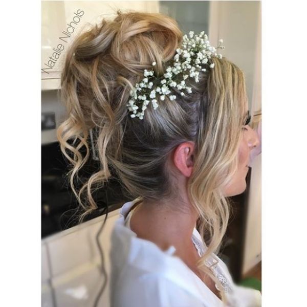 High Messy Bun with Falling Strands