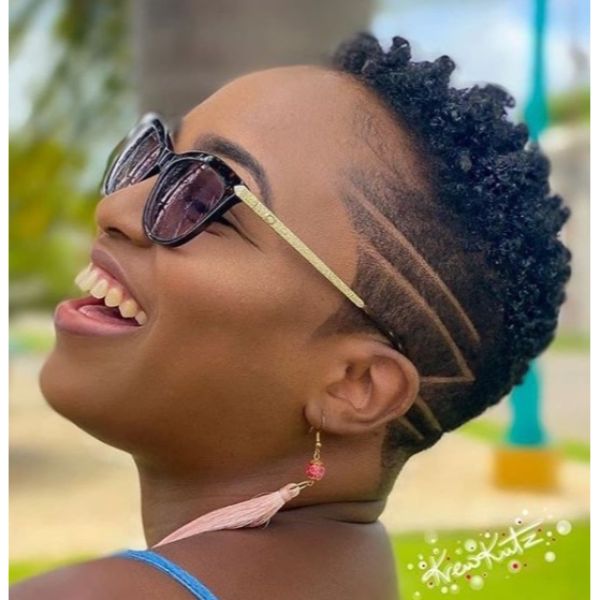 a woman with Short Twa Sides and Razor Design Hairstyle