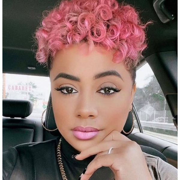 Shaggy Curly Pink Hairstyle with Shaved Sides