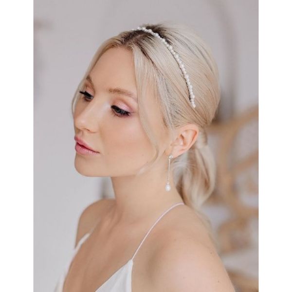  Wedding Hairstyle With Sleek Curly Ponytail And Pearl Headband