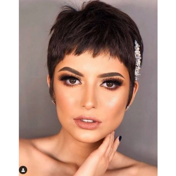 A woman with Dark Wedding Hairstyle For Short Pixie Hair