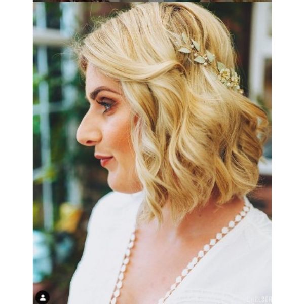 a woman with Soft Wavy Bob With Floral Headpiece