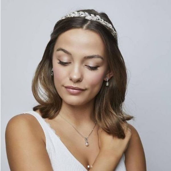 a woman with Straight Natural Bob With Tiara