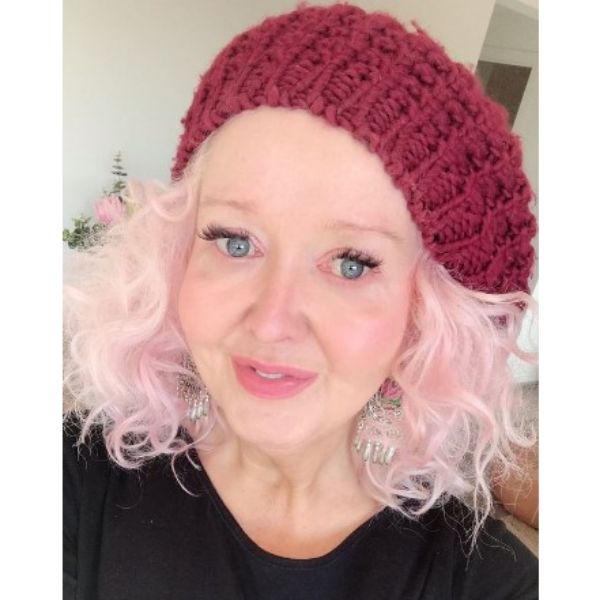 Medium Curly Pink Hairstyle With Beanie