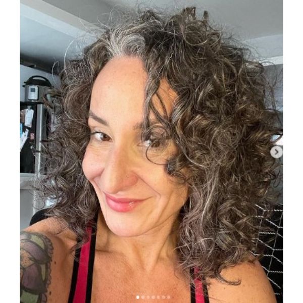 Messy Curly Silver Gray Medium Hairstyle For Older Women