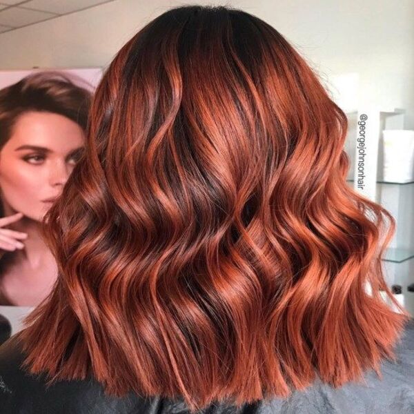 Spicy Rusty Red Auburn Hair - A woman inside a salon