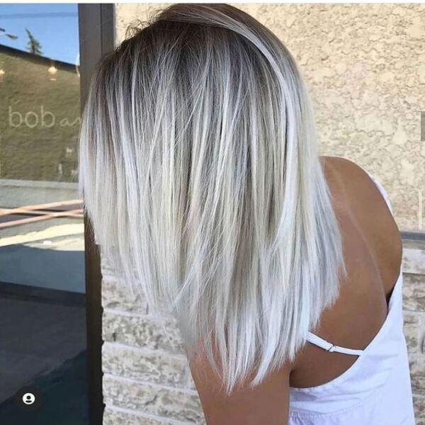 Blonde Platinum Silver for Straight Hairs - A woman in her sexy white top
