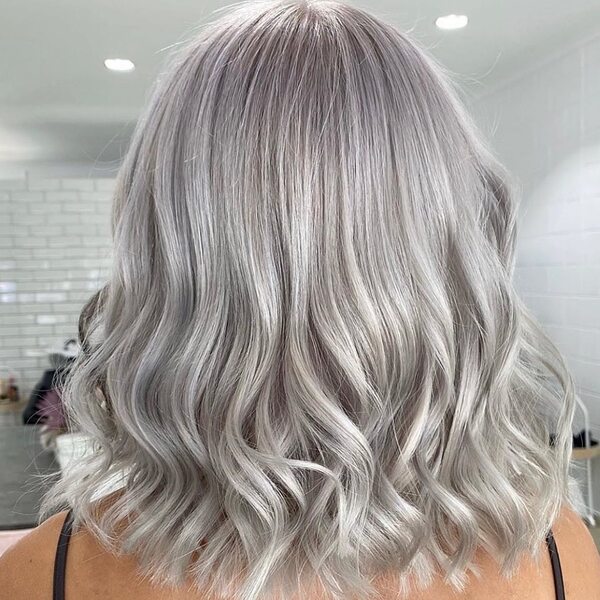 Silver Platinum For Wavy Short Hair - A woman in her sexy top