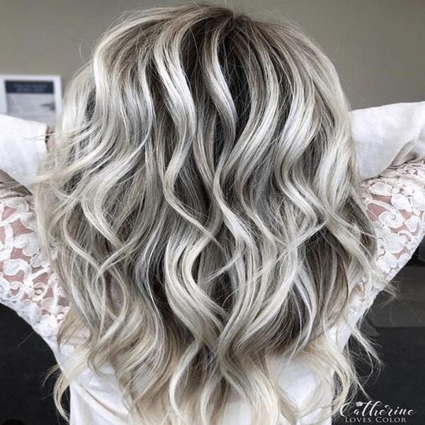 White-Silver Highlights Perfect for Burnette Hair - A woman in her white lace sweater