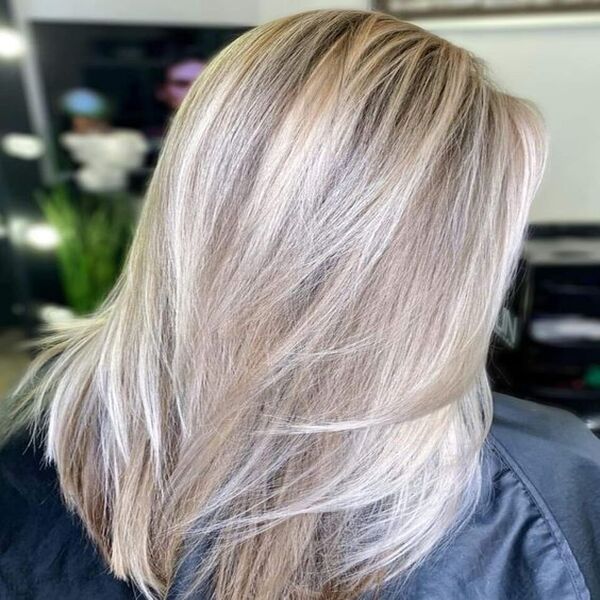 Brown Balayage Ombre for Fox Cut - A woman inside the salon