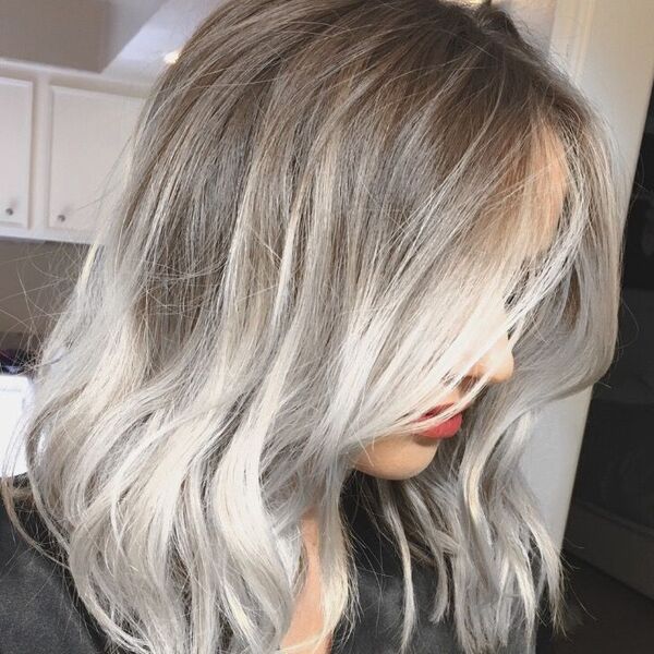 Ash Blonde Balayage Hairstyle - a woman wearing a red lipstick