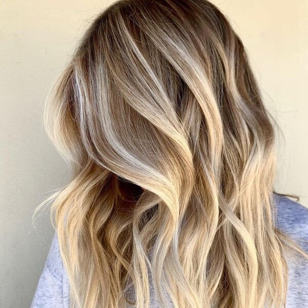 Caramel and Platinum Blonde Balayage - a girl wearing a light gray shirt