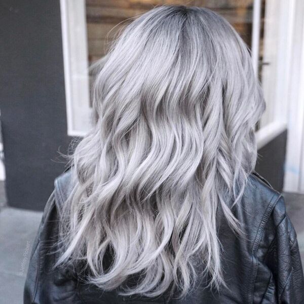 Metallic Silver for Long Hair - a woman wearing a black leather jacket