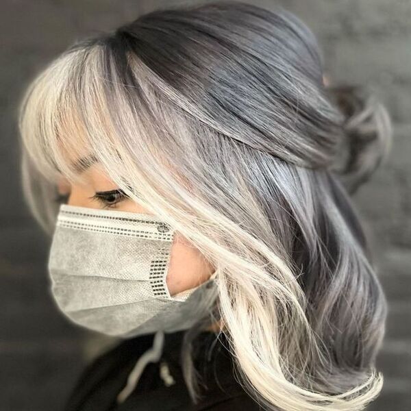 Platinum White Money Pieces Hair - a girl wearing a gray facemask and an eyeliner