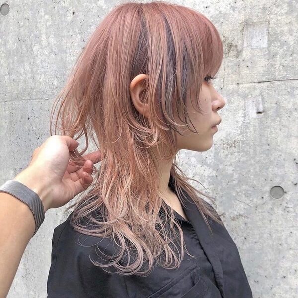 Unique Hot Pink Wolf Haircut - an asian girl wearing a black polo shirt