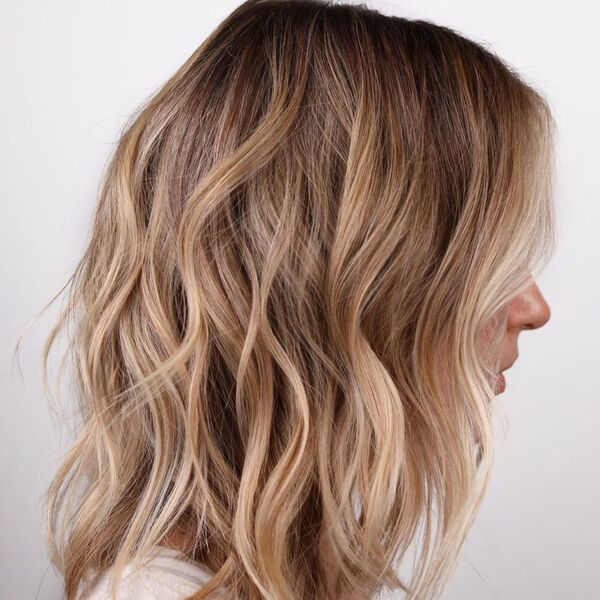 Waves with Dirty Blonde Highlights on Medium Length Hair