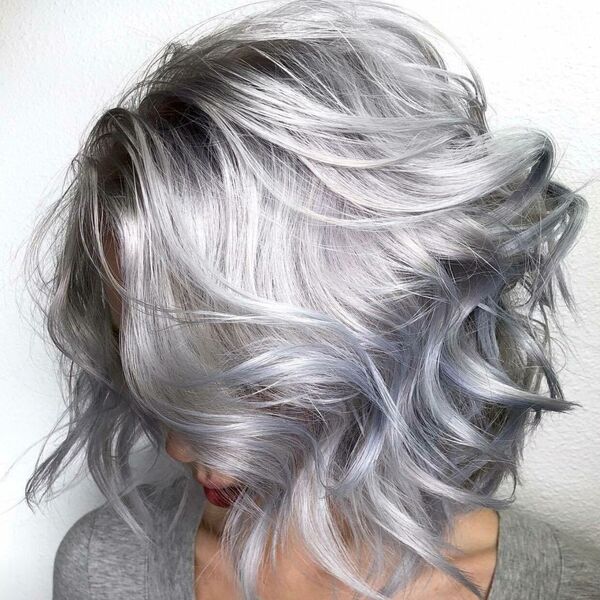 Wavy Platinum Silver Hair - a girl wearing a gray shirt and red lipstick