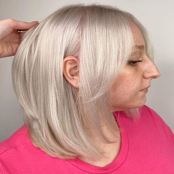 A woman with her ash grey bob hairstyle