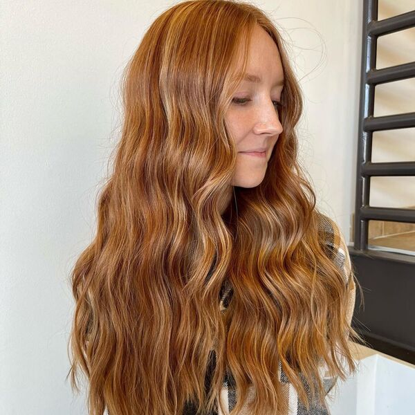 Big Waves Auburn with Caramel Highlights - a woman wearing a checkered polo