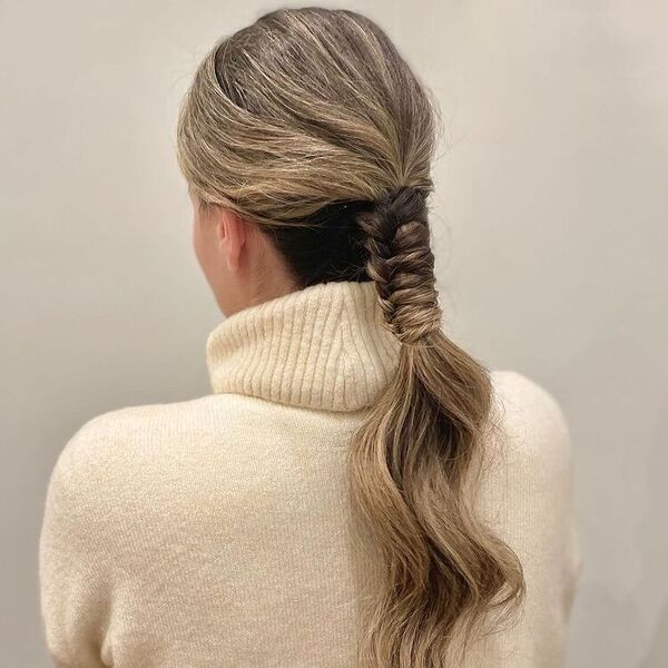 Blonde Hair Ponytail Braids - A woman with a blonde hair wearing a turtle neck sweater