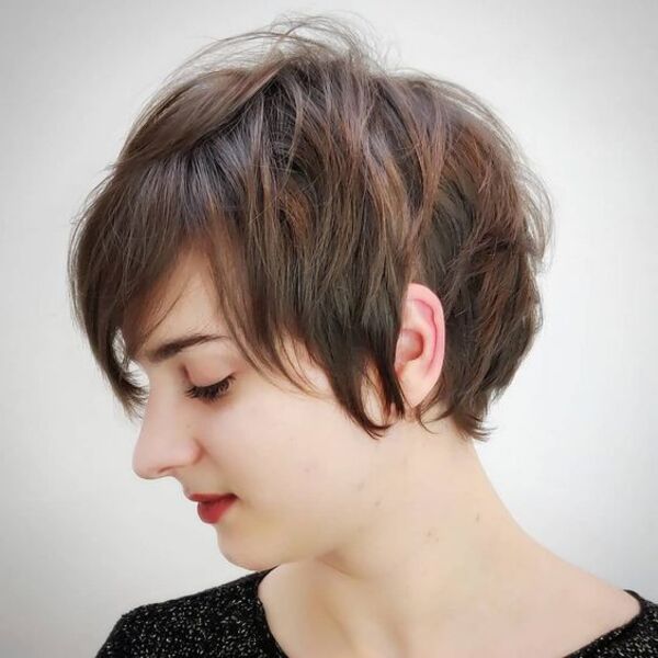 Classic Shaggy Pixie Hair - A woman in her black top