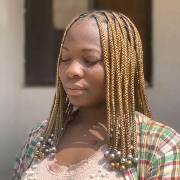 Colored Stitch Braids - A woman wearing a checkered top