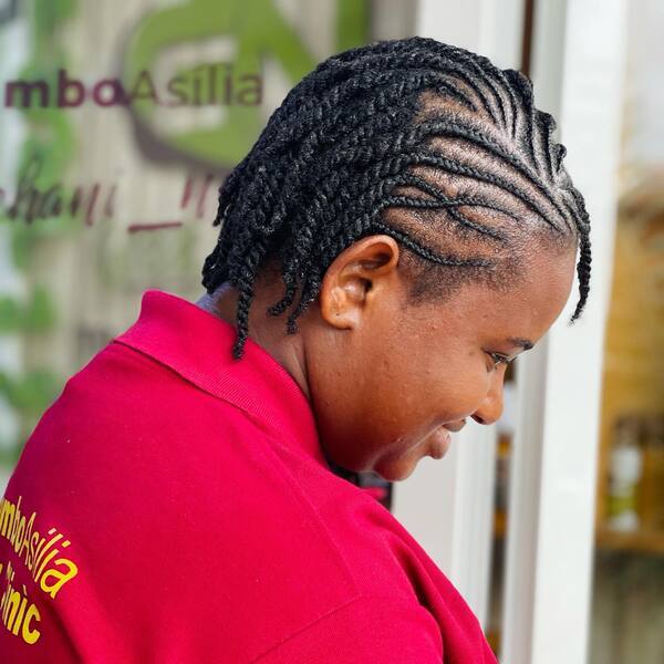 Cornrows Twist Hairstyle - A woman wearing a red printed shirt