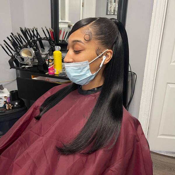 Half Up and Half Down Sleet Hair - A woman wearing an air pods