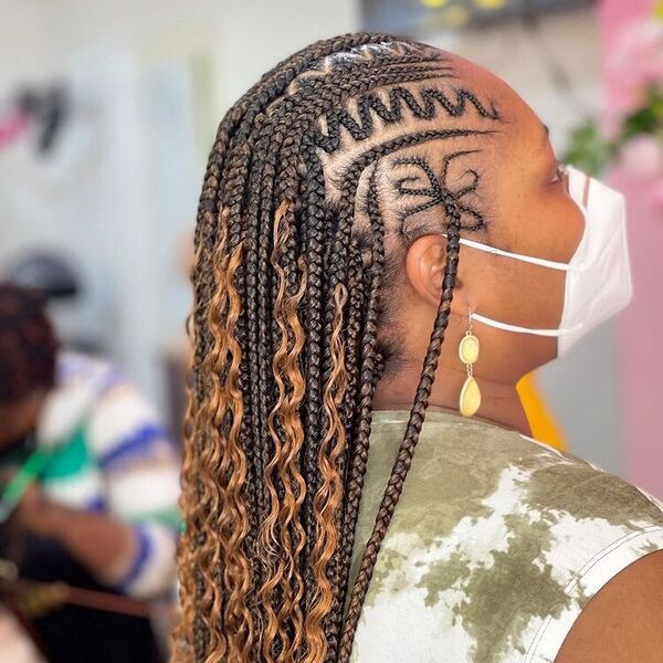 Knotless Cornrows Braid - A woman with long gold earrings and a color white KN95 face mask