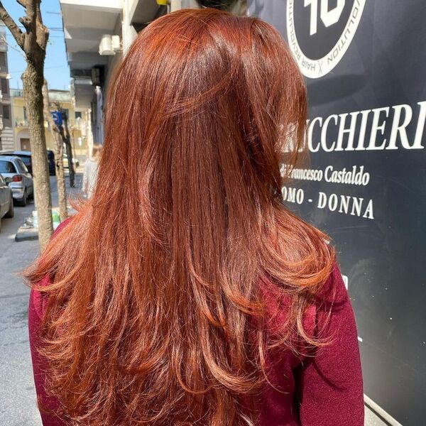 Light Auburn for Flipped Edge Hair - a woman wearing a red sweater