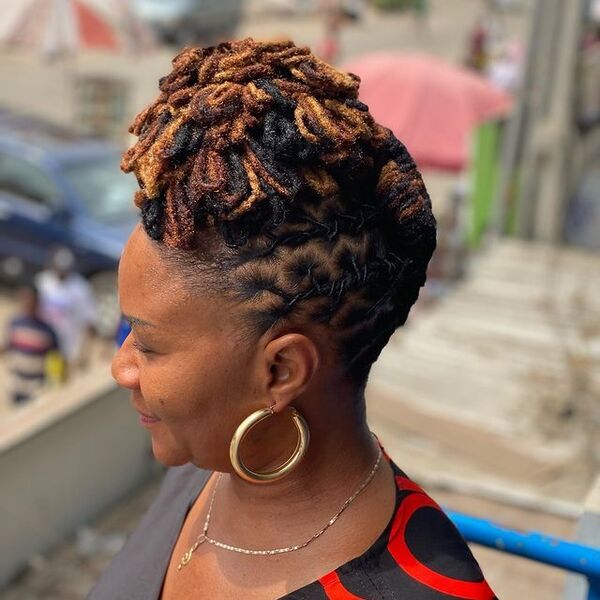 Loc Petals with A Hint Copper Brown - A woman wearing earrings Dreadlock Hairstyles