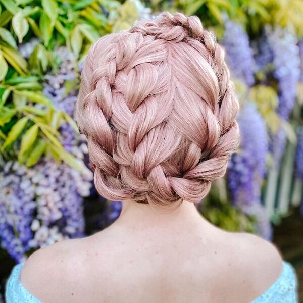 Milkmaid Braids Style - a woman wearing a sky blue off shoulder