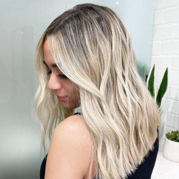 Mushroom Ombre Hairstyle - A woman wearing a sleeveless top