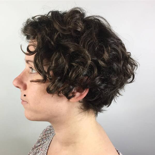 Natural Curl Coils Pop Shag Hair - A woman with a mole