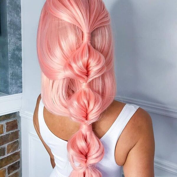 Pink Hair Fishtail Ponytail Braids - A woman wearing a white bodycon dress